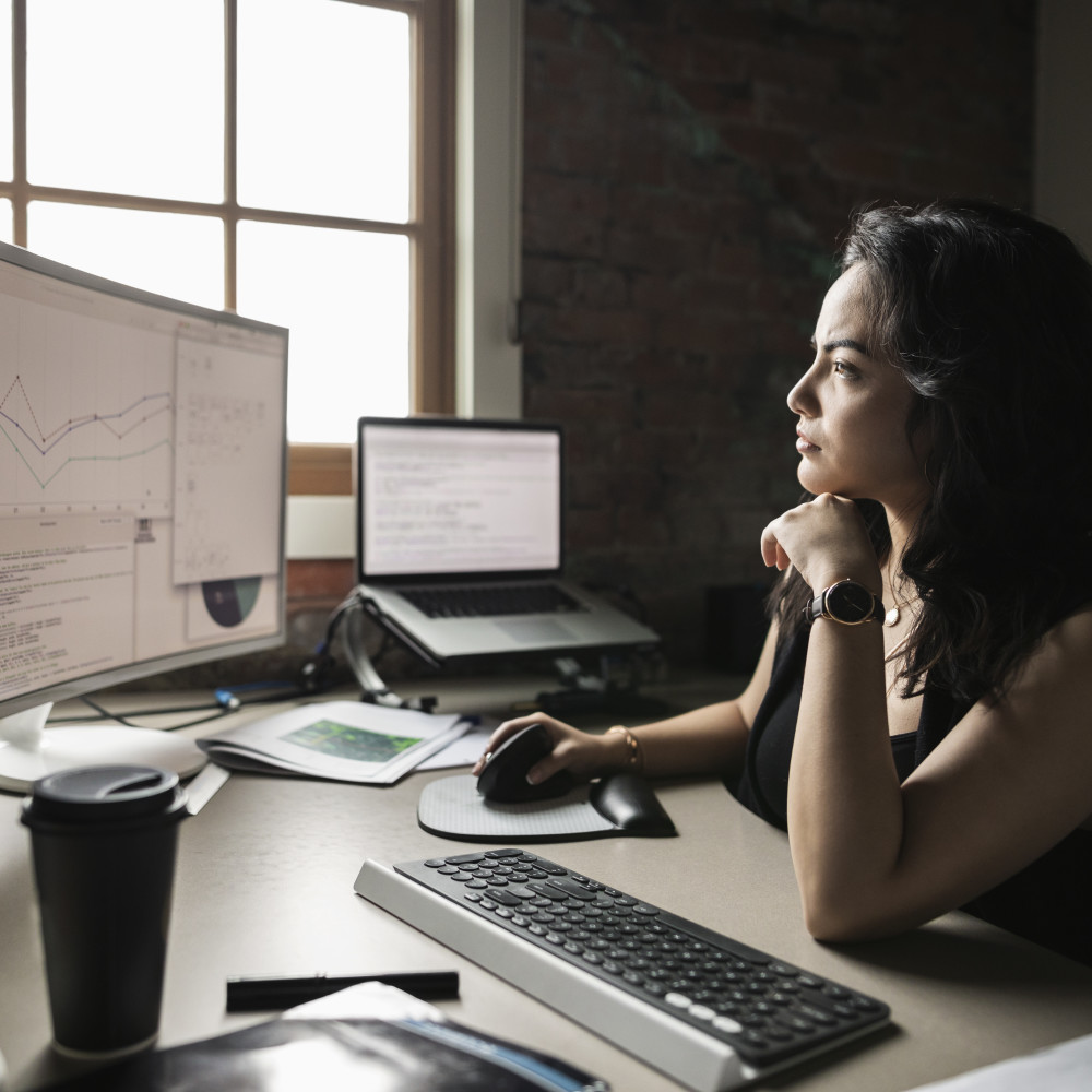 Focused businesswoman working at computer in office